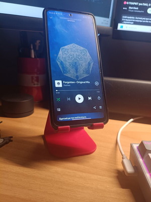 Mobile phone stand for desk with simultaneous charging, new