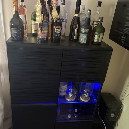 Living room unit with display cabinets and LED lighting