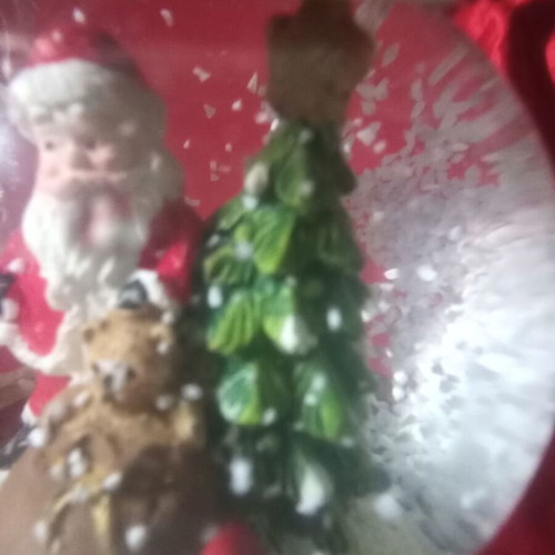 Christmas souvenir like new with Santa Claus and falling snow