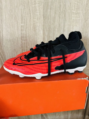 Nike football shoes like new, sizes 22 and 35, black and red