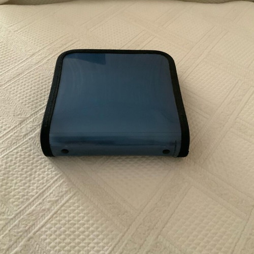 CD case like new, holds 24 CDs, ideal for car use