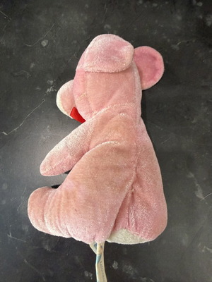 Plush pig with red bow