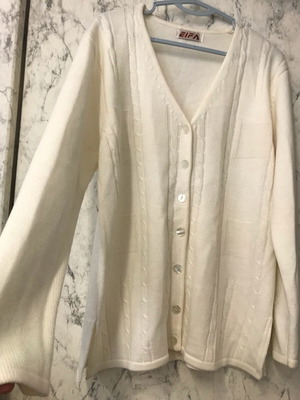 Ecru cardigan with braids and buttons used