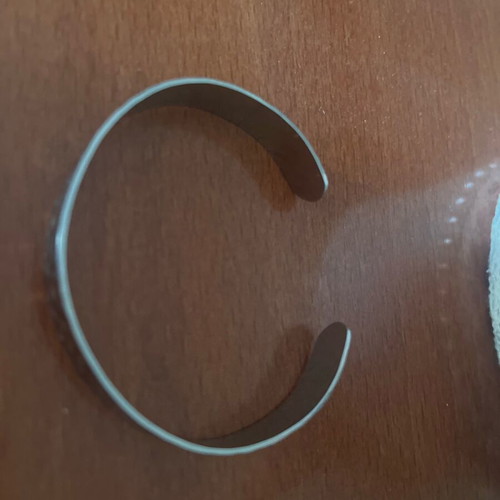 Steel bracelet like new, adjustable, silver color