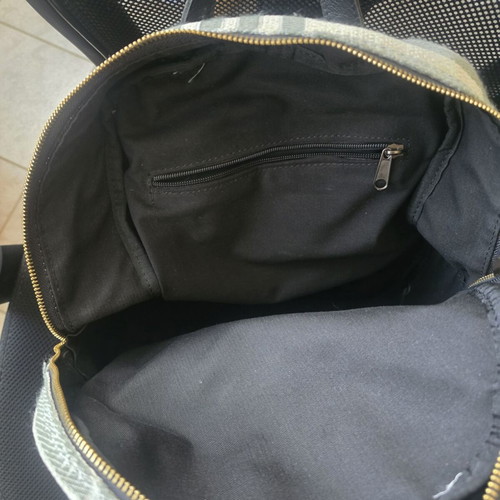 Achilleas Accessories backpack like new, black and gray with zipper repair needed