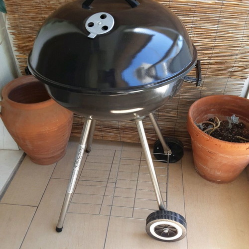 Bormann Charcoal Grill used with wheels and shelf