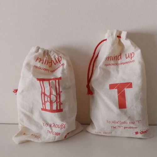 Puzzle game like new, pack of two with instructions and cloth bag