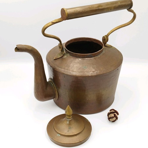 Vintage copper hand-forged teapot used with brass elements