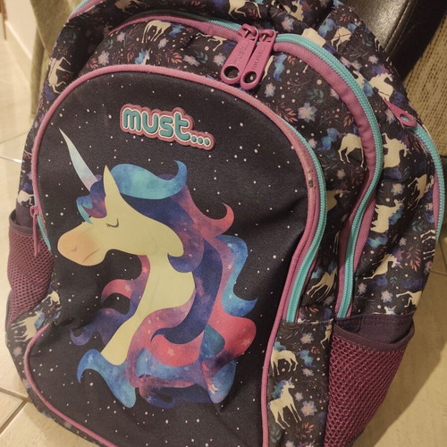 Unicorn school backpack, glows in the dark