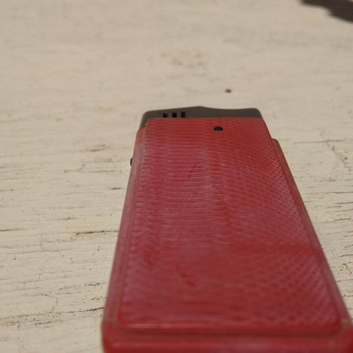 Ronson butane gas lighter used, red