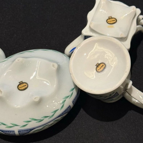 Limoges porcelain miniatures set like new, handpainted floral design