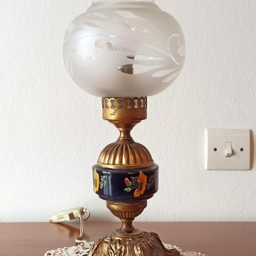 Vintage table lamp with glass shade and decorative metal base used