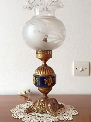 Vintage table lamp with glass shade and decorative metal base used