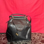 Leather shoulder bag black with gold details used
