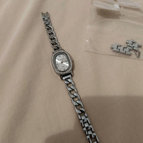 Women's silver watch like new with rhinestones and adjustable band