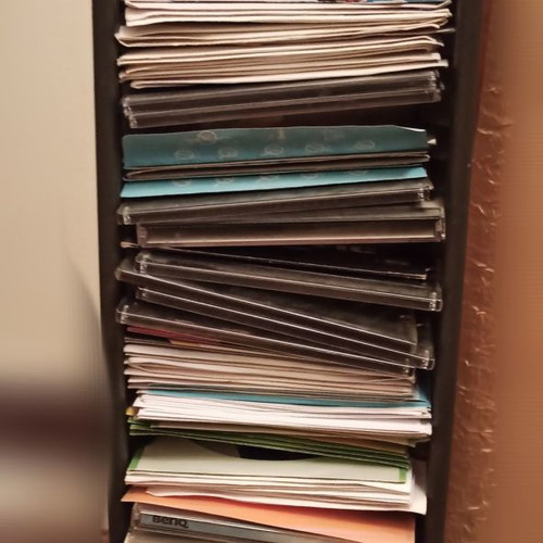 Plastic CD case used, black, floor or tabletop