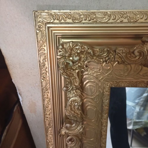 Vintage retro mirror with carved ornate gold frame used