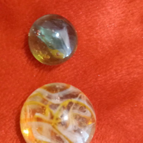 Vintage glass marbles used, set of 2, large one chipped