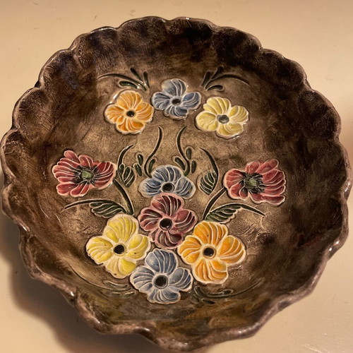 Vintage handmade ceramic bowl with embossed flowers like new