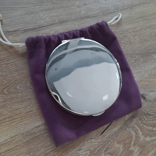 Compact mirror for bag used with purple velvet pouch
