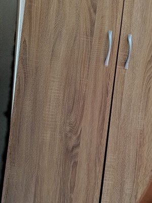 Wardrobe with damaged bottom drawer