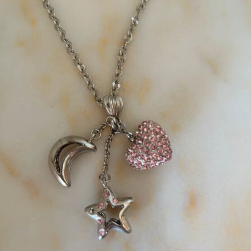 Silver necklace like new with three pendants heart, star and moon