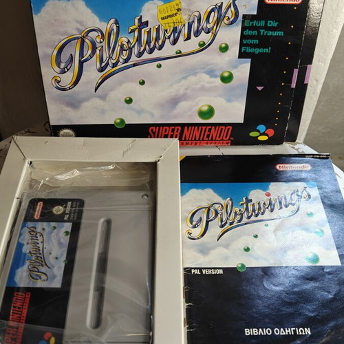Pilotwings Super Nintendo Entertainment System game used with Greek manual