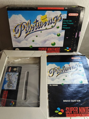 Pilotwings Super Nintendo Entertainment System game used with Greek manual