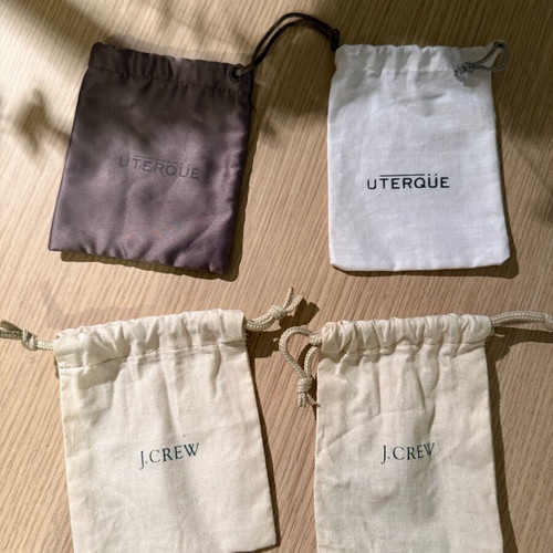 J Crew and Uterque pouches like new
