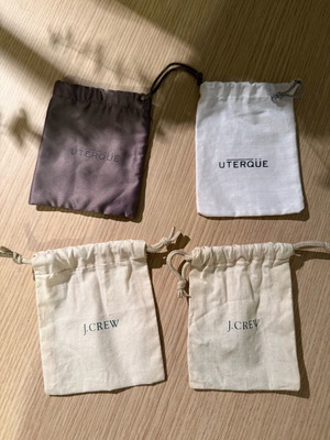 J Crew and Uterque pouches like new