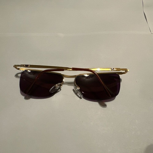 Vogue vintage sunglasses with gold metal frame and purple lenses, new