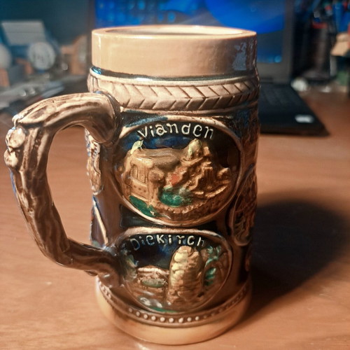 Vintage ceramic beer mug with embossed Luxembourg scenes, like new