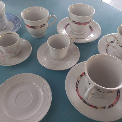 Set of 7 assorted cups and saucers