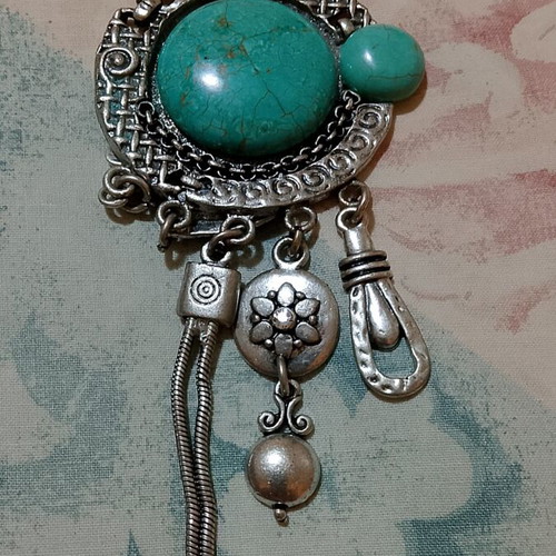 Necklace with turquoise stone, silver color