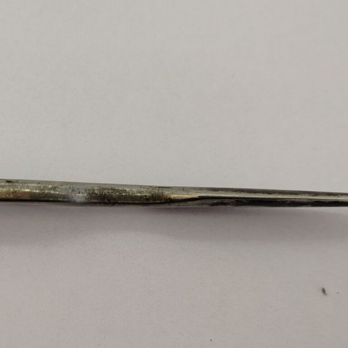 Vintage metal letter opener with unique handle