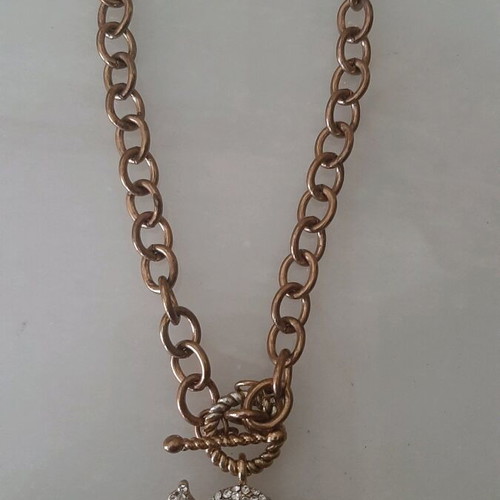 Necklace used pink gold color with skull design