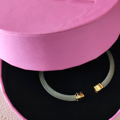 Tous bracelet with gold 750 and stainless steel in new condition