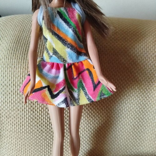 Barbie Fashionistas doll like new with colorful geometric dress and orange boots