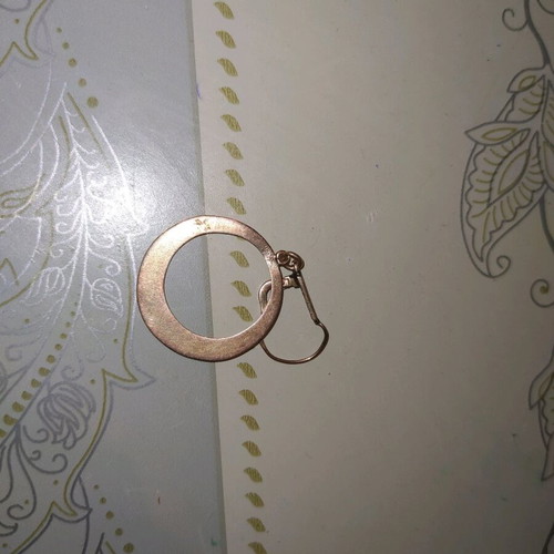Earring old used, copper-like
