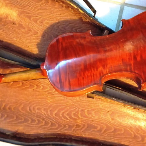 Violin used without bow and strings with old case