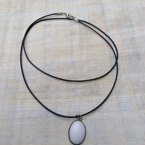 Handmade pendant with white nephrite and steel cabochon