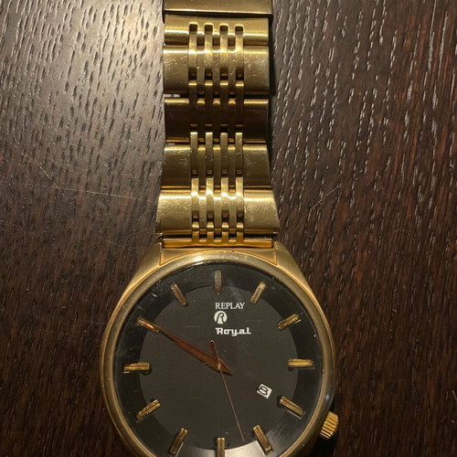 Replay wristwatch like new with black dial and gold bracelet