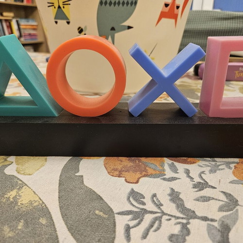 PlayStation Icons Lamp like new with colored symbols on black base