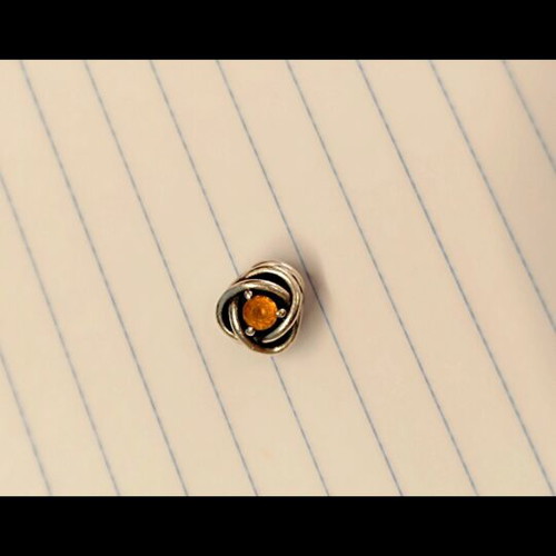 Pandora Honey Eternity Circle Charm with honey-colored stone