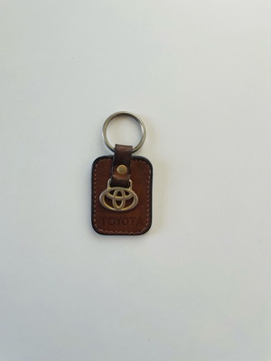 Toyota 90’s leather keychain used, brown and silver