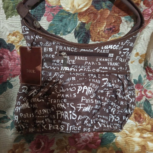Fabric bag with decorative flower
