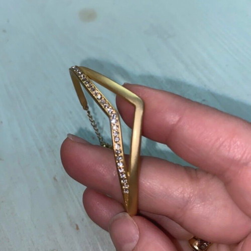 Bracelet made of steel and zircon stones, new, gold color