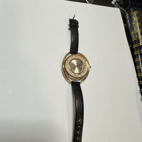 Wristwatch with rhinestones, black and gold