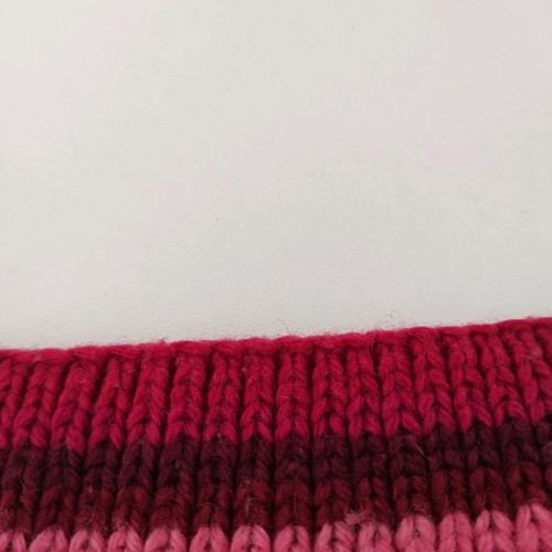 Knitted scarf in shades of pink Barbie like new