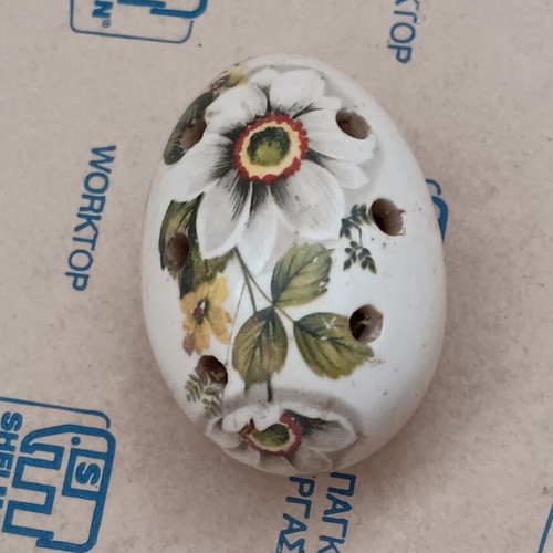 Ceramic incense stick holder egg-shaped used, floral design